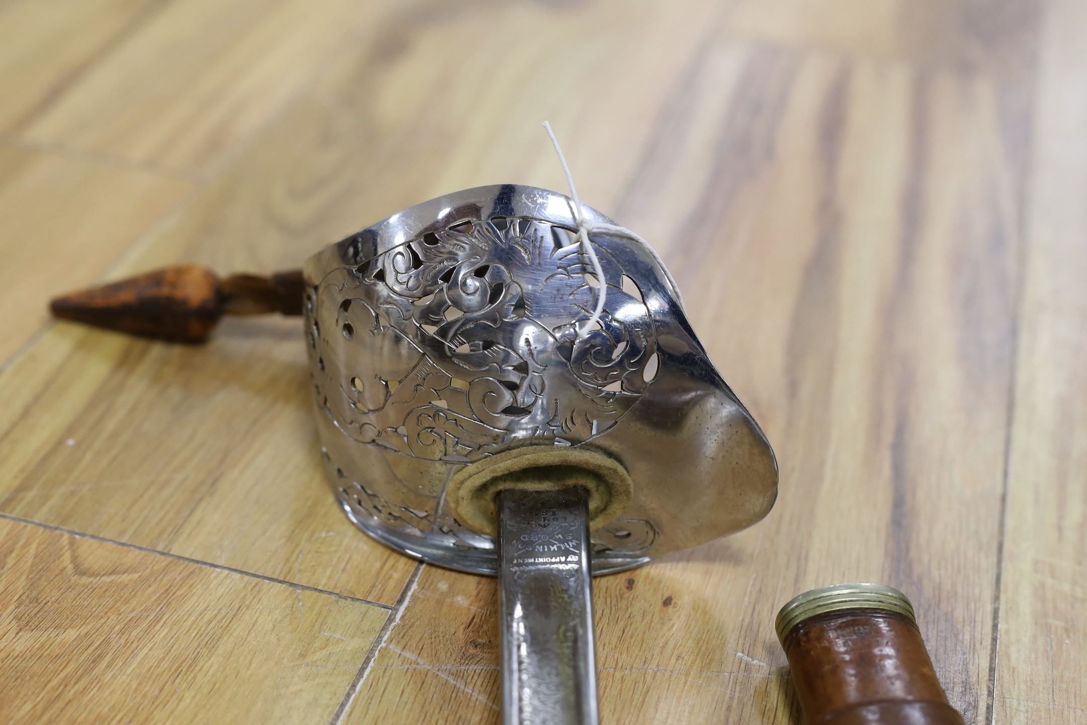 A Wilkinson George V officer's dress sword, stamped 1930 with broad arrow